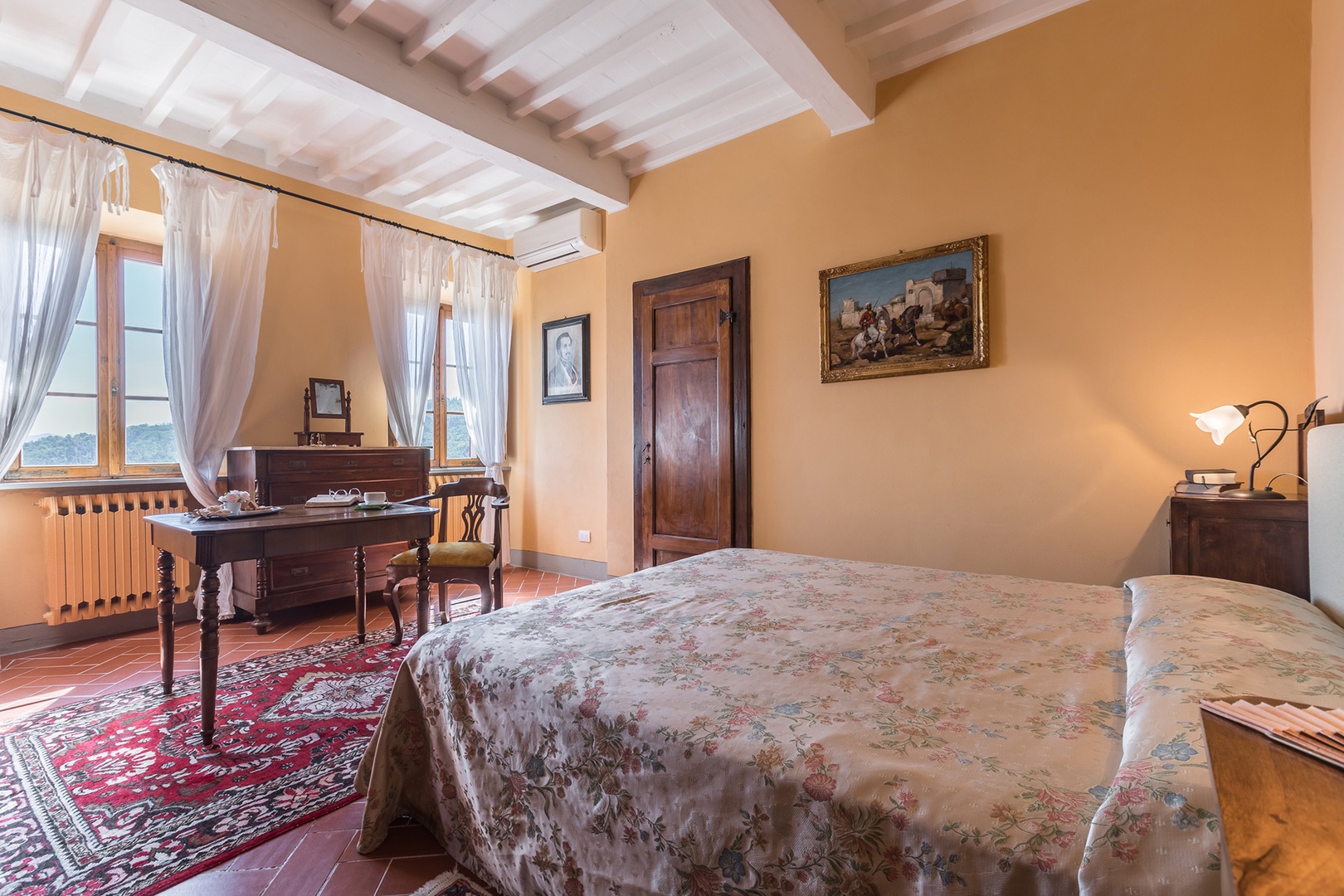 Light filled bedroom 5 with a beautiful view and en suite bathroom.