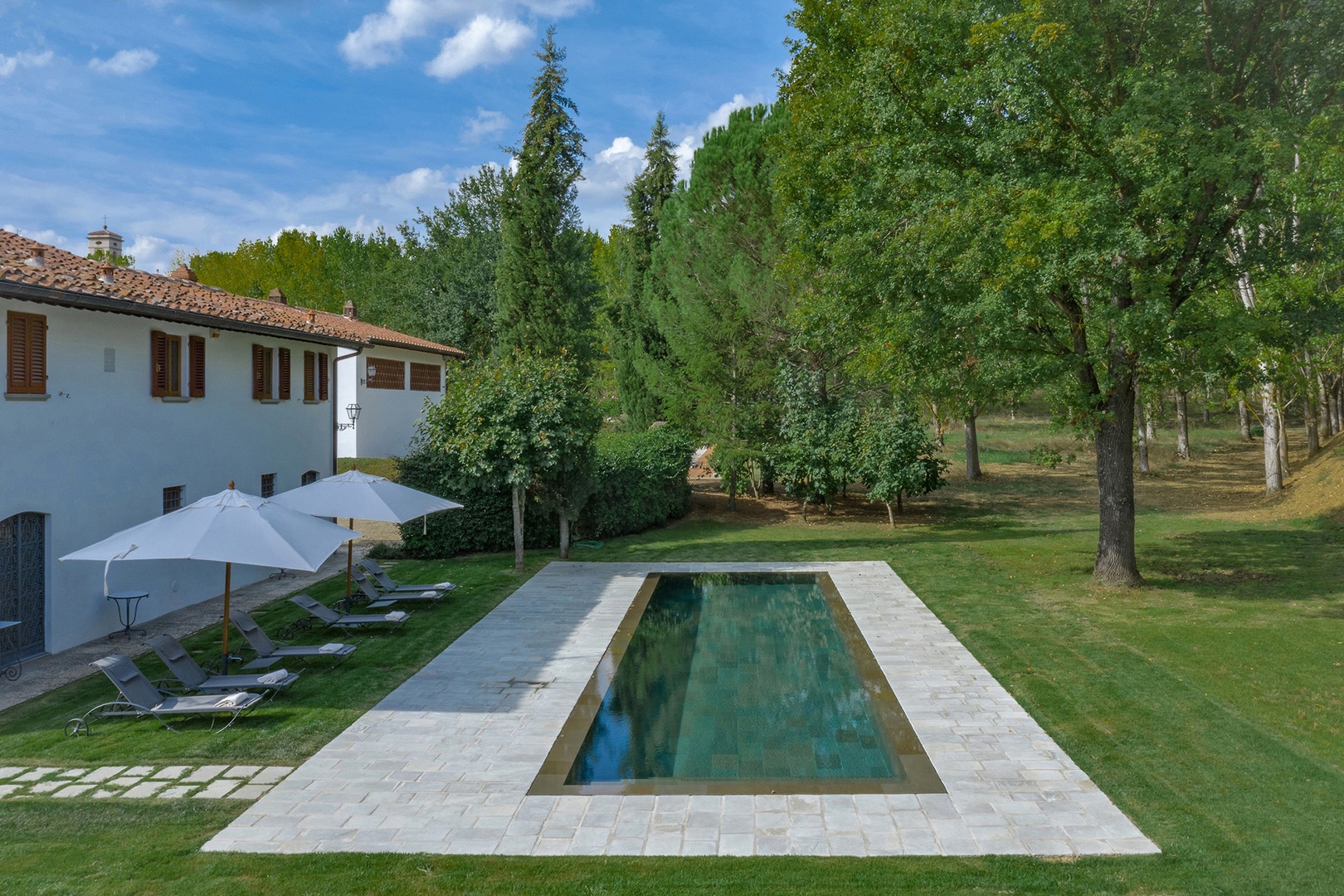 Tranquil azure pool awaits you at Passera Villa.