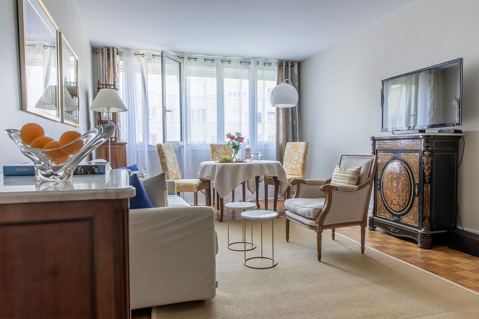 Large window in the living room lets in lots of natural light.