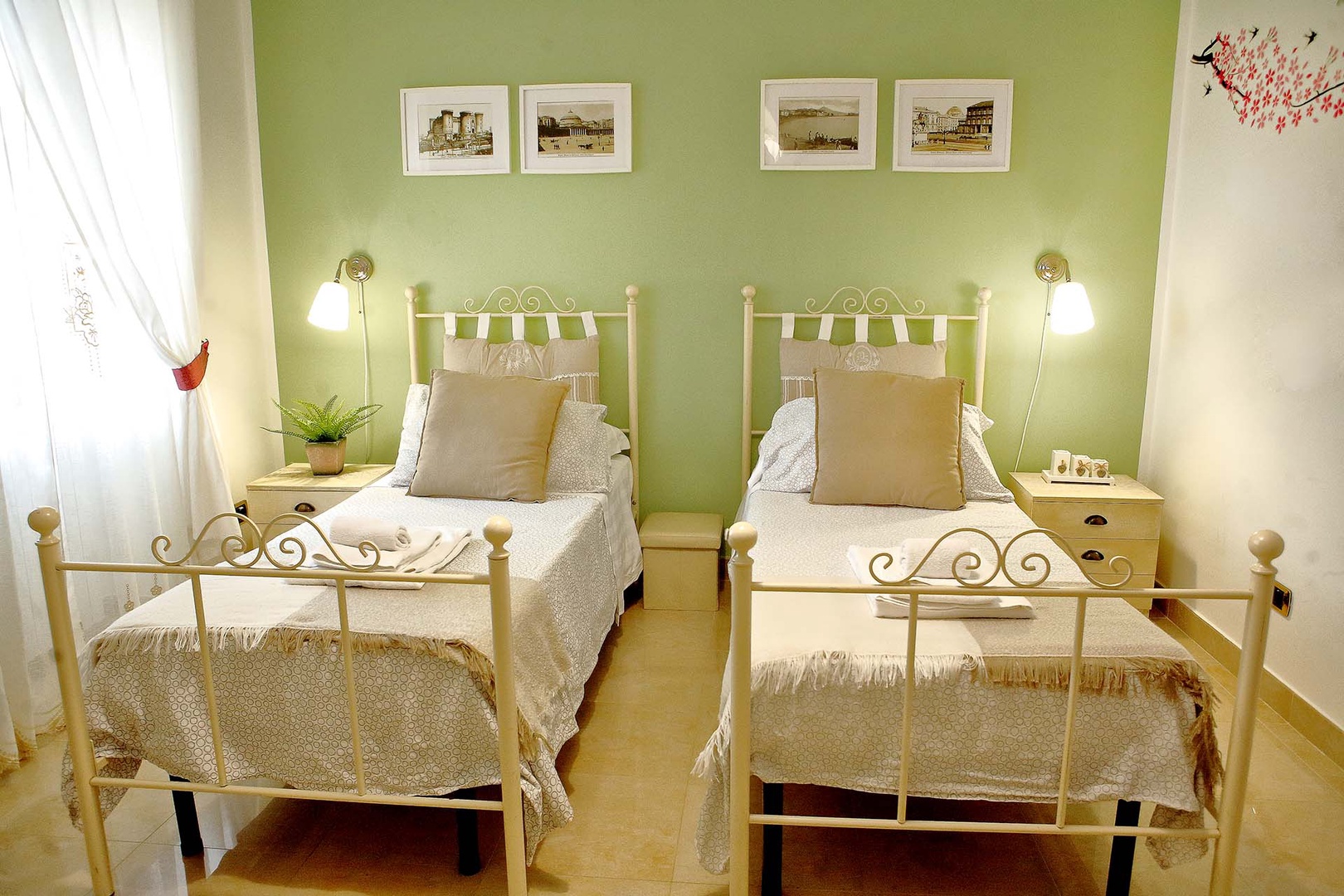 Bedroom 2 has two single beds and a daybed.