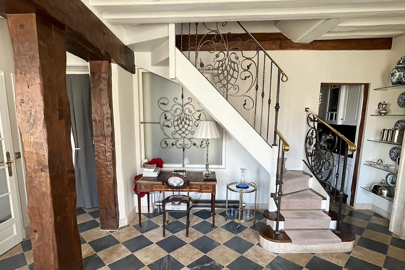 Internal staircase leads up to the second level bedrooms.