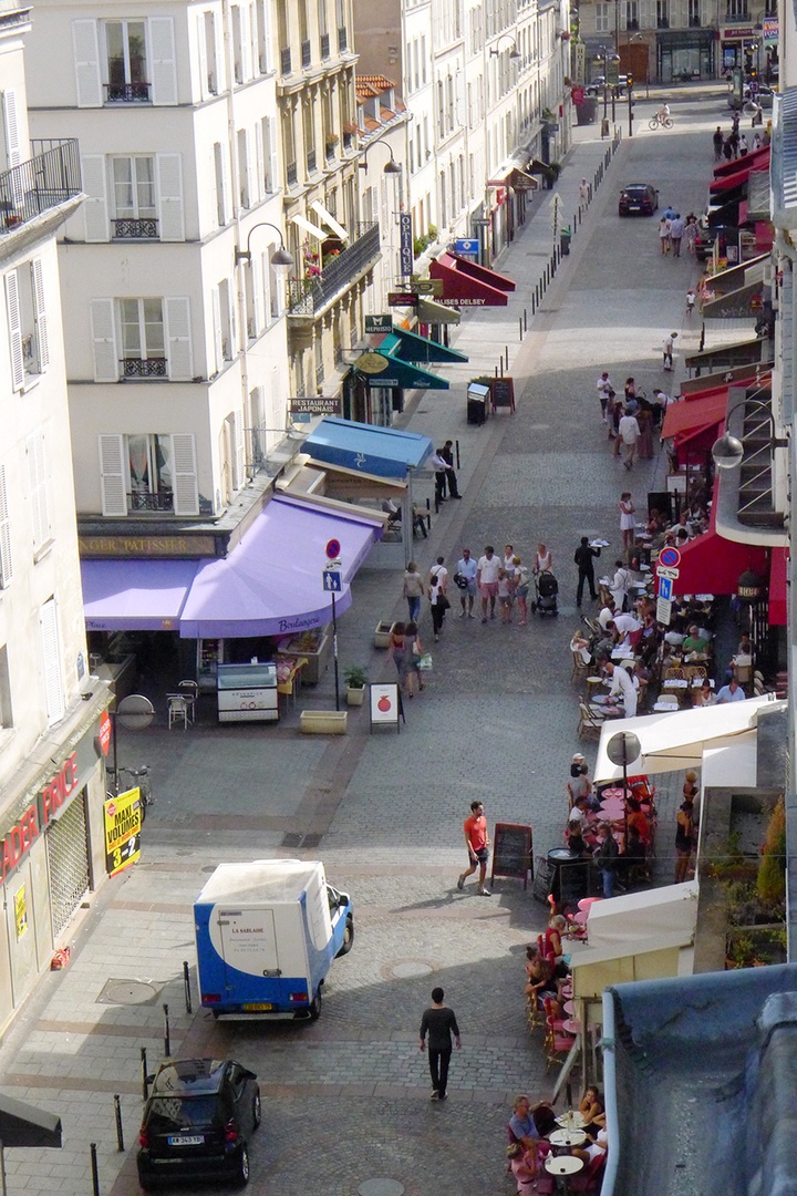 View of the lively Rue Cler market street