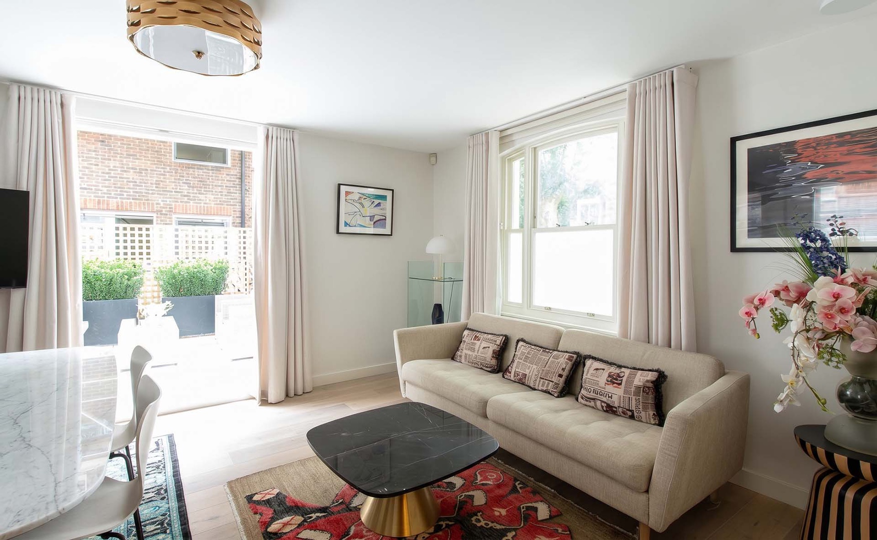 Room to relax both indoors and out on the private patio.