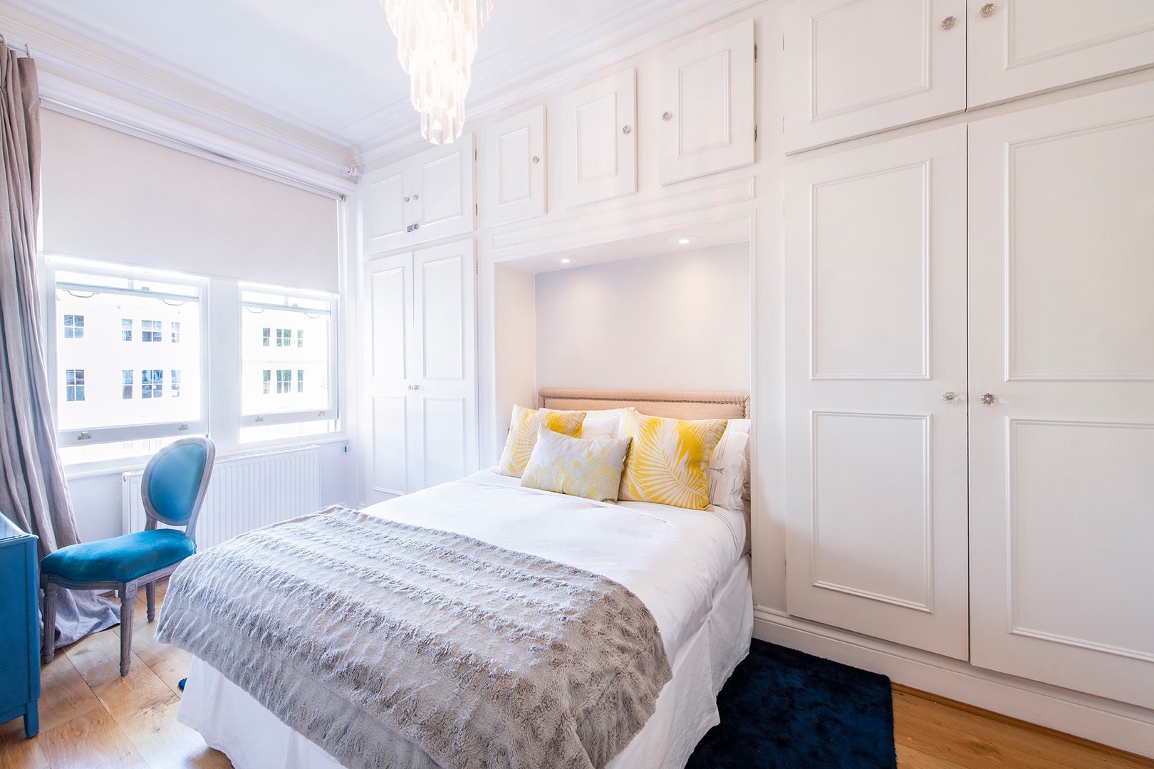 Bedroom 1 has ample storage in the built-in closets.