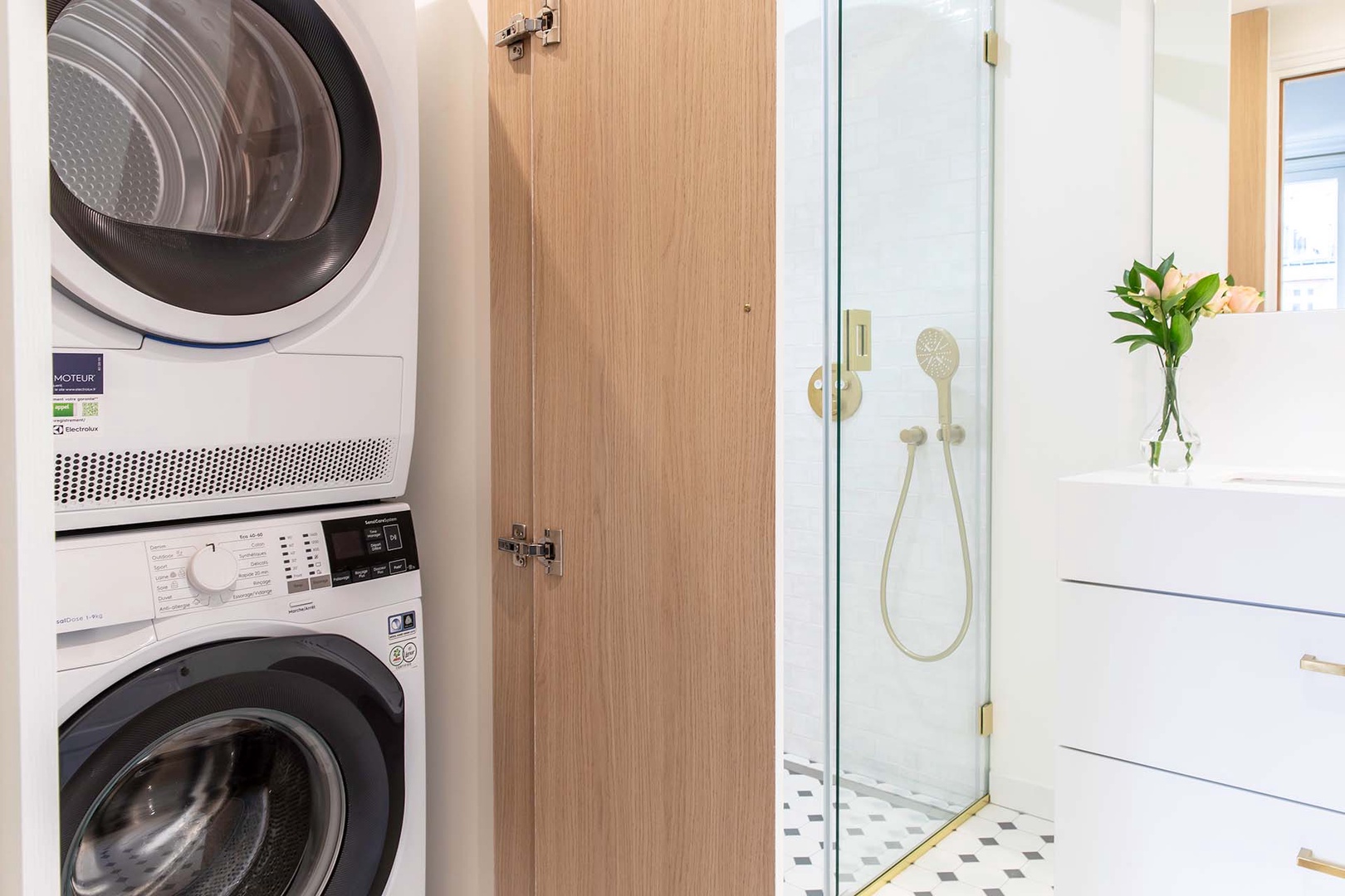 Separate washer and dryer located in bathroom 2.