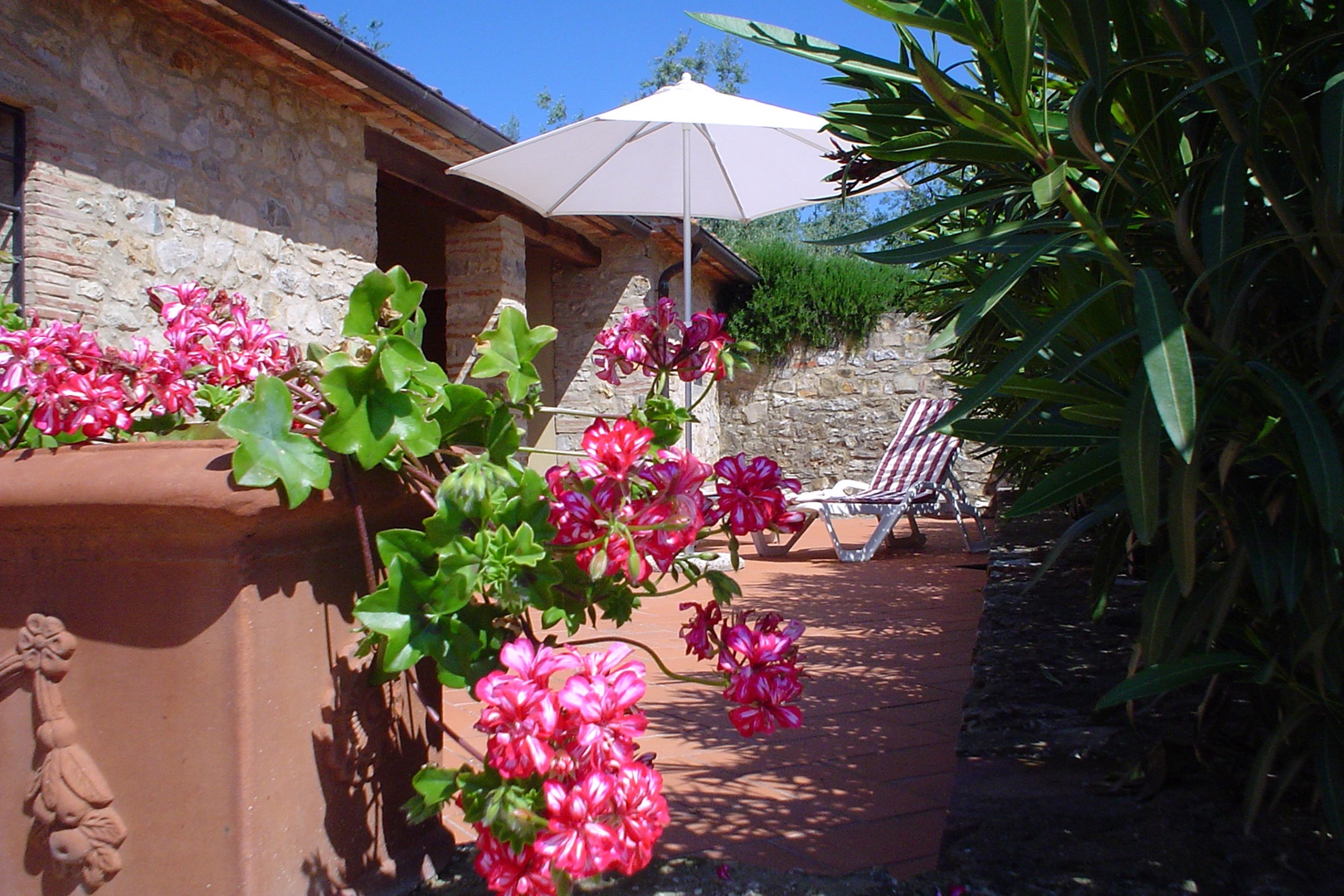 Loggetta's private patio. The cottage measures 860 square feet (80 square meters)