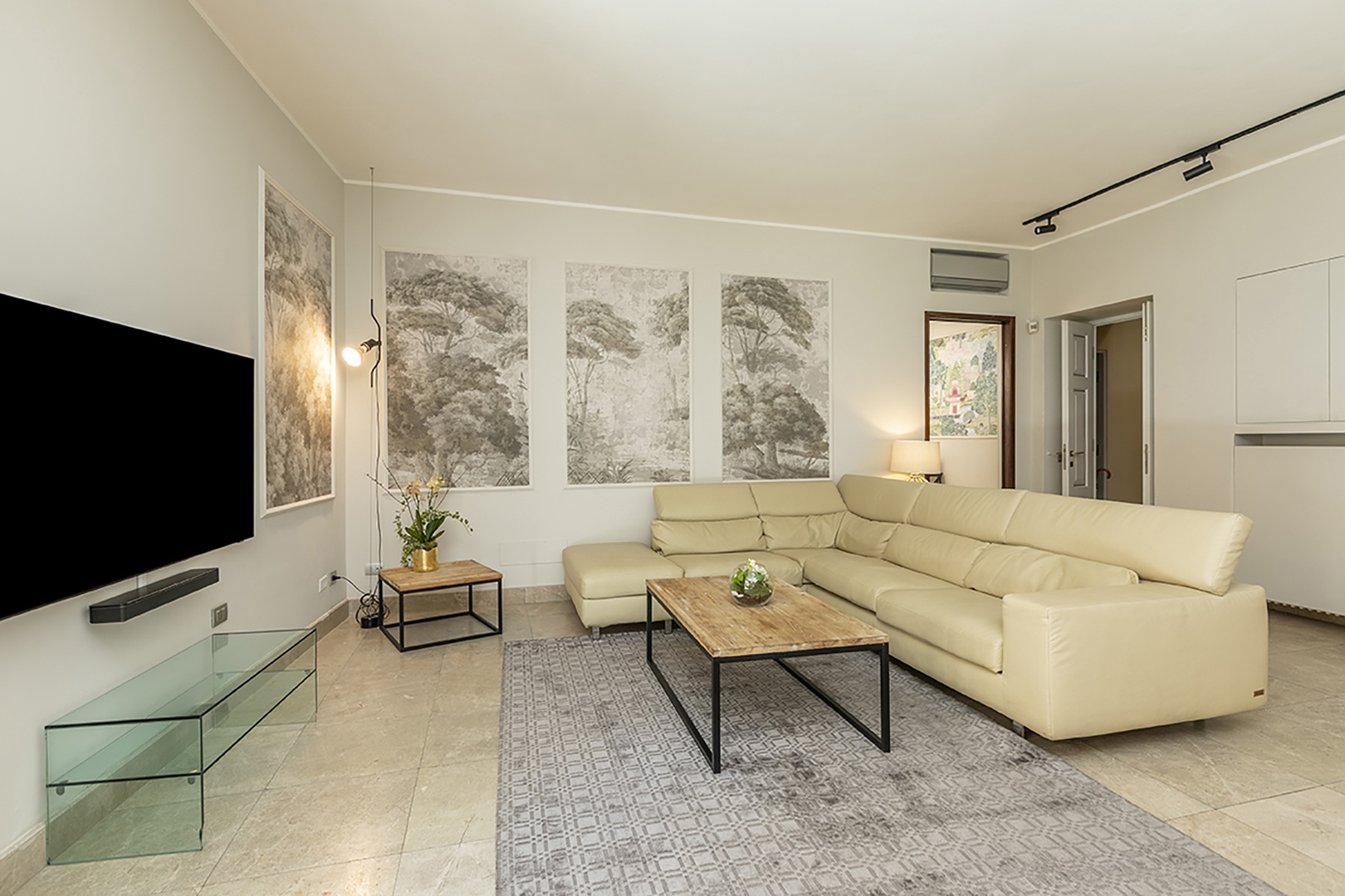 The living room offers a relaxing sofa.