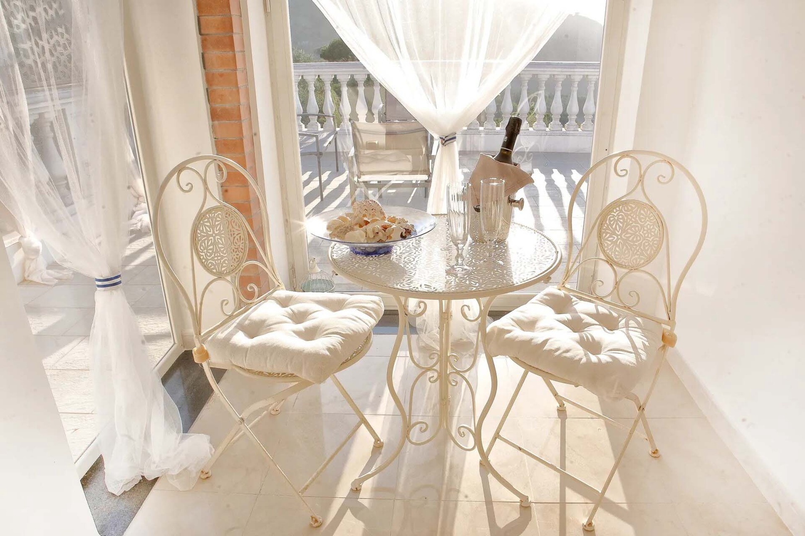 Cute bistro table on upper level.
