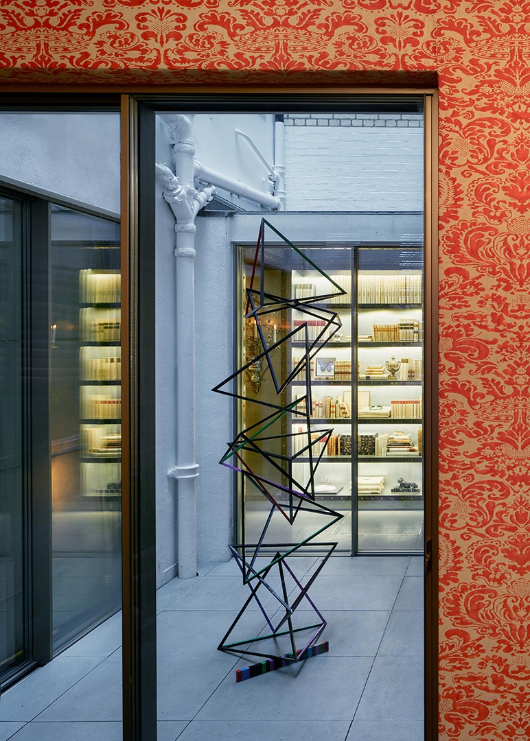 Internal courtyard with sculpture adds light and an artistic touch.