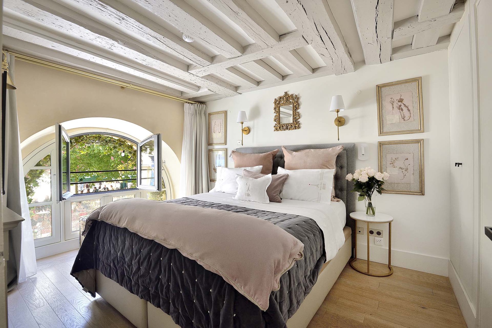 Enjoy the sumptuous bed and tasteful décor in bedroom 1.