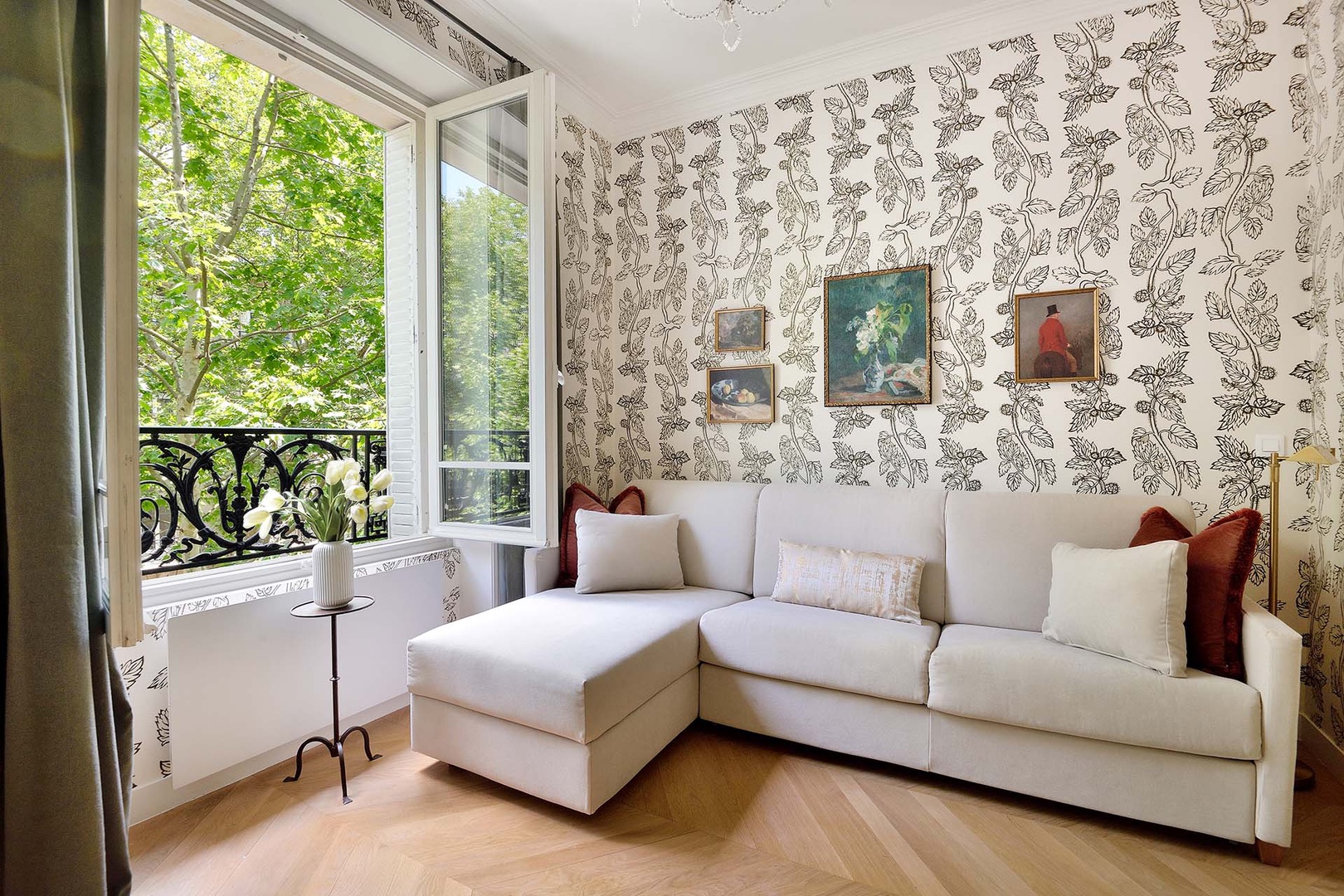 The sofa converts to a high-quality bed in this stylish second living room which doubles as a third bedroom.