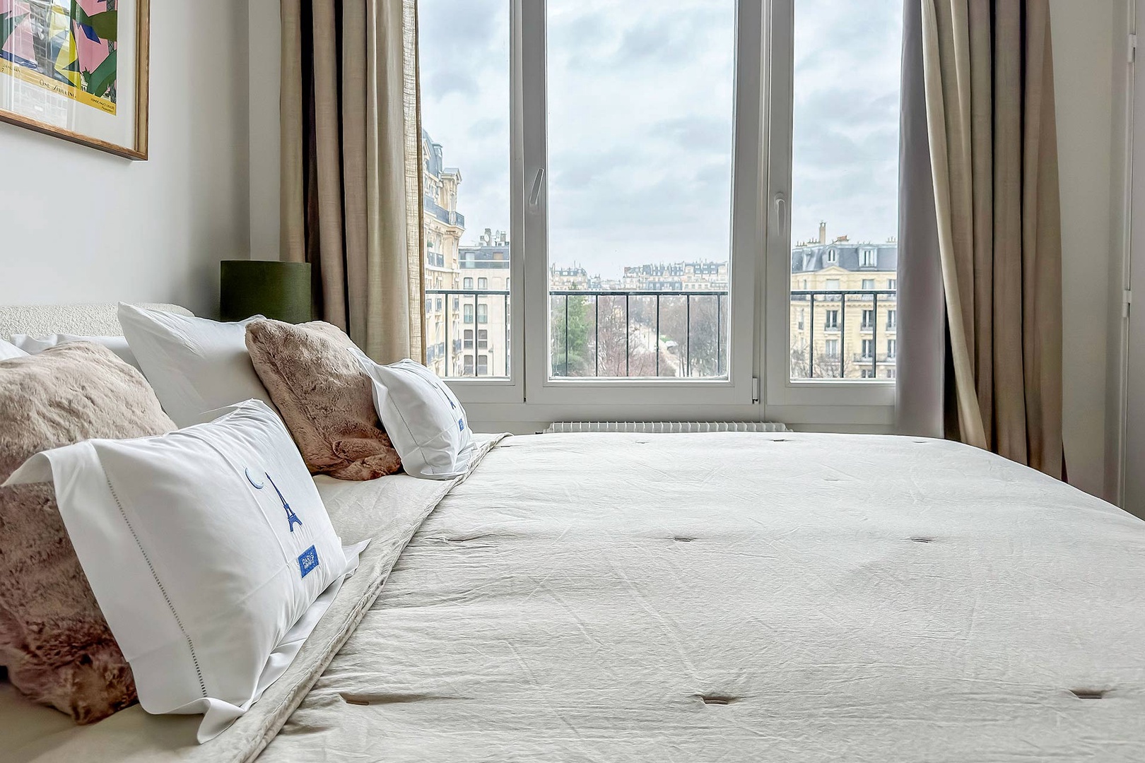 Bedroom 1 has view of Champ de Mars and Eiffel Tower to left.