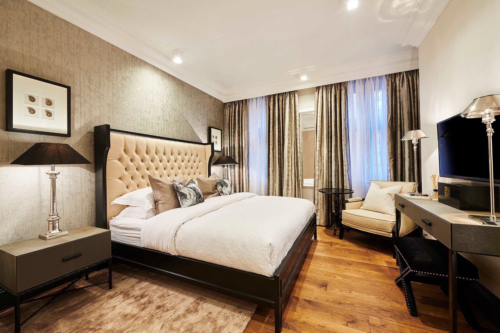 Sumptuous first bedroom with designer furnishings