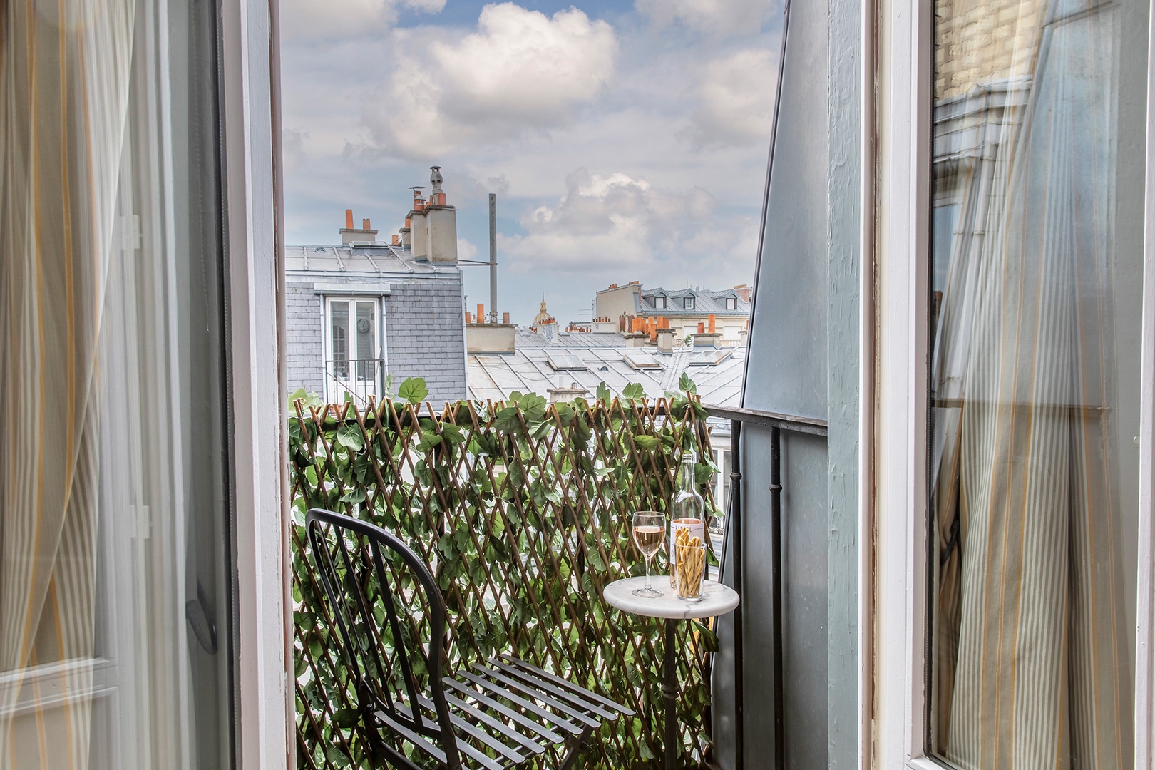 Classic Parisian views from the bedroom balcony will delight!