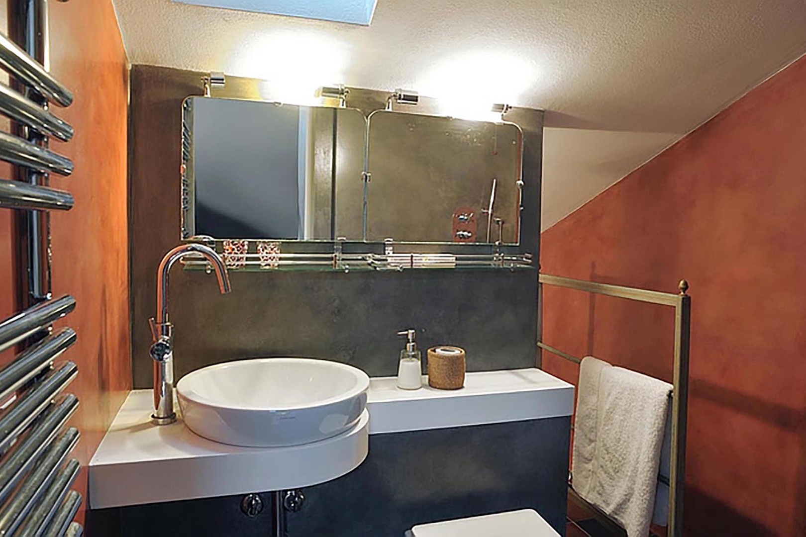 Bathroom with shower on the top floor near the playroom.