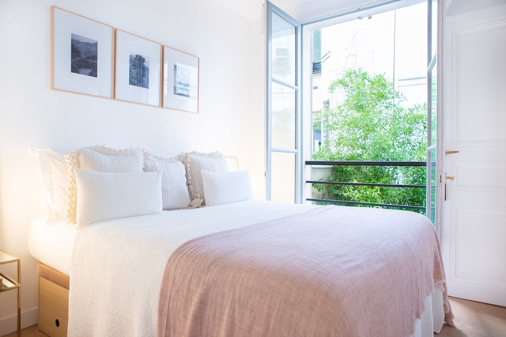 Wake up next to the French window with lovely courtyard views.