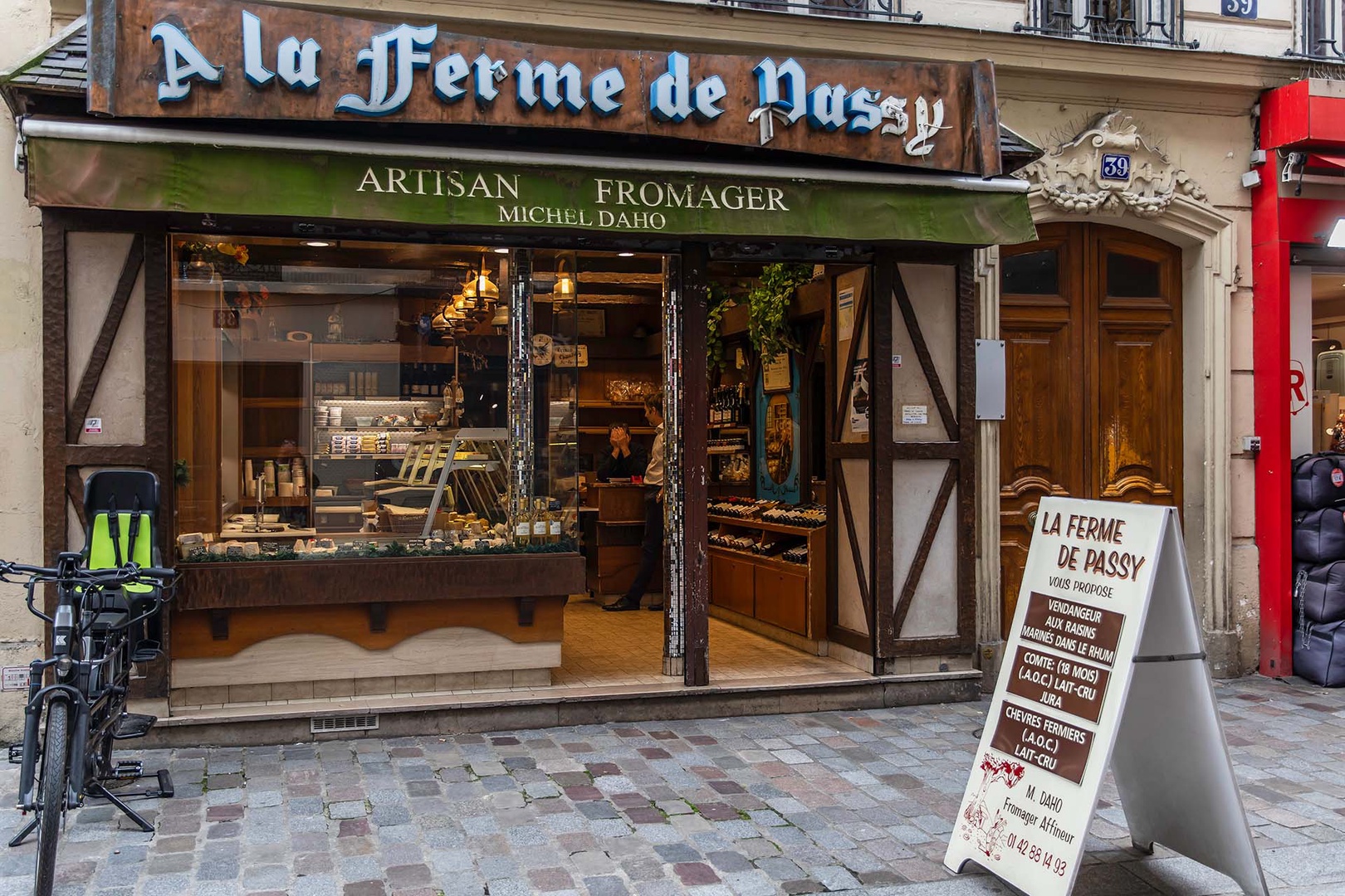 Just around the corner on Rue De L'Annonciation is this delightful cheese shop .