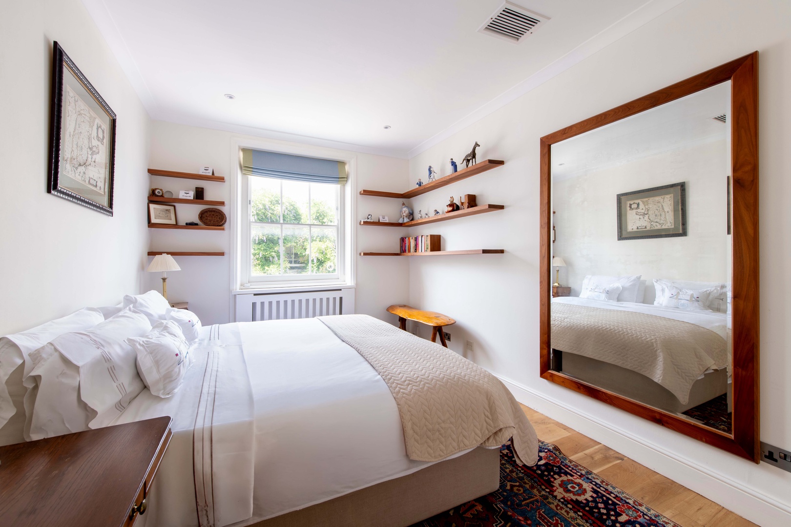 Bedroom 2 with a comfortable bed and stylish decor.