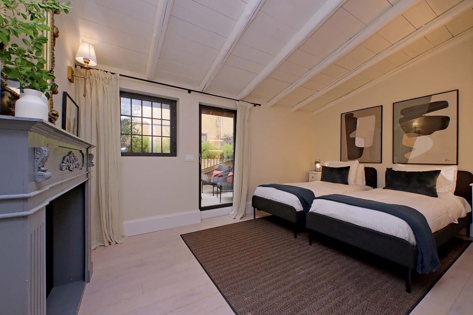 Glass door in bedroom 2 opens to the terrace.