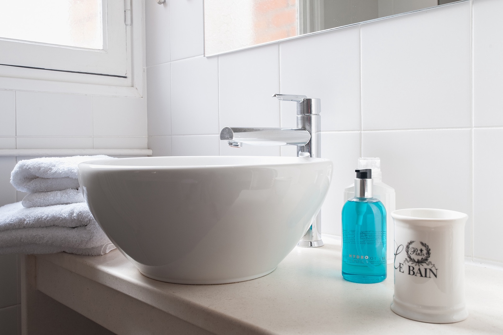 There are practical double sinks in the en suite bathroom.