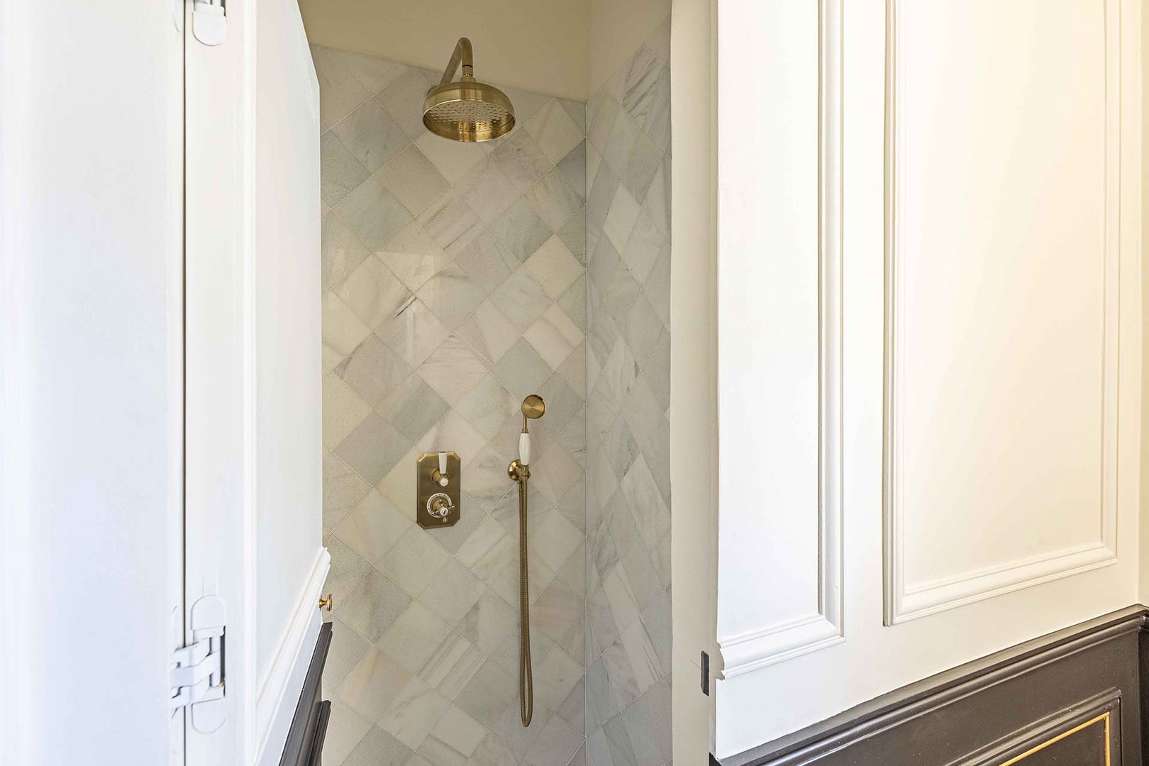 Shower in powder room for added flexibility.