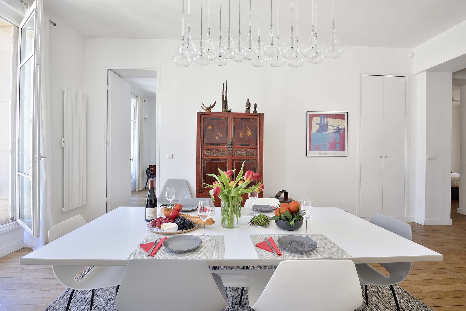 Gorgeous modern lighting over the dining table.