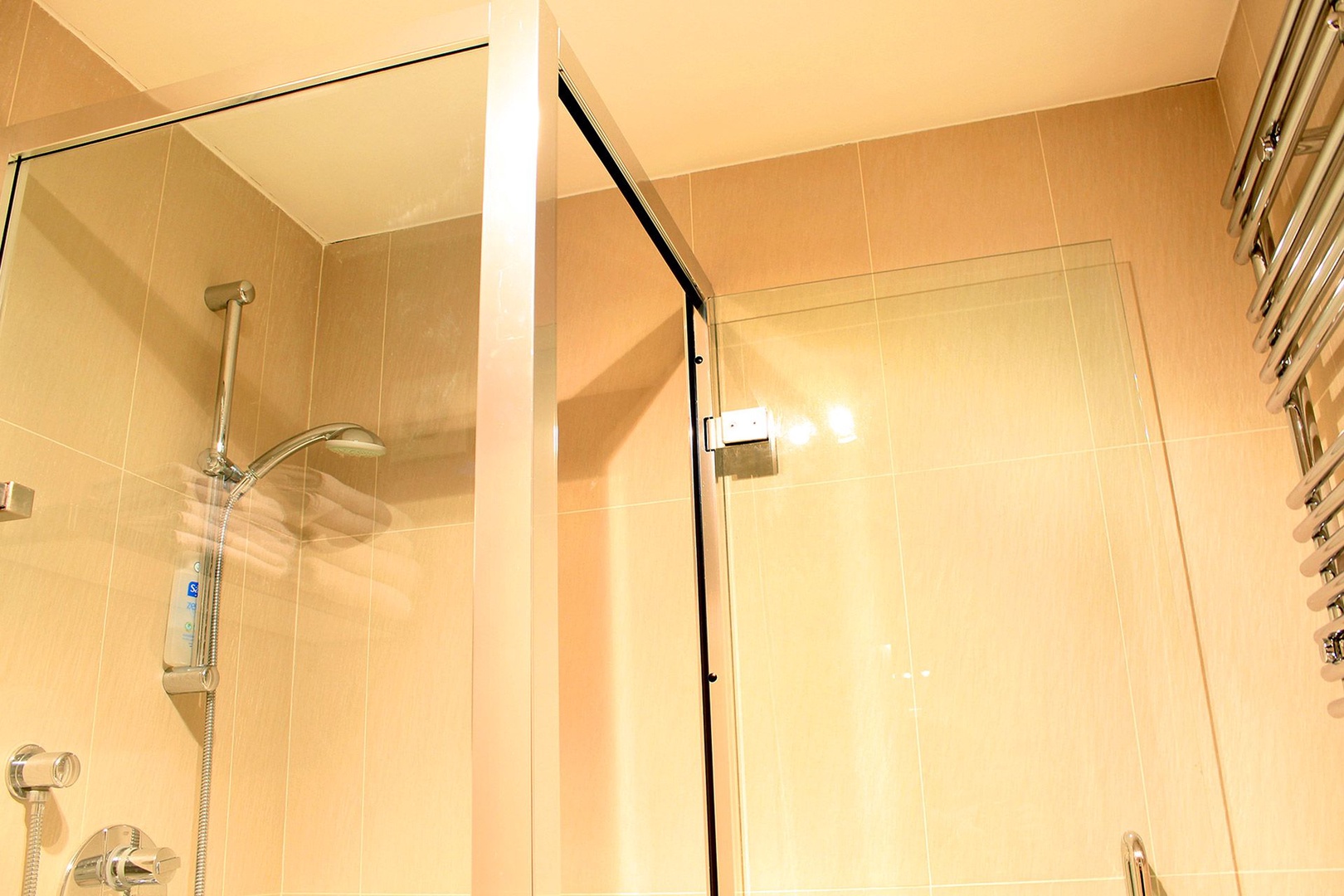 Step inside your enclosed shower at the Russell
