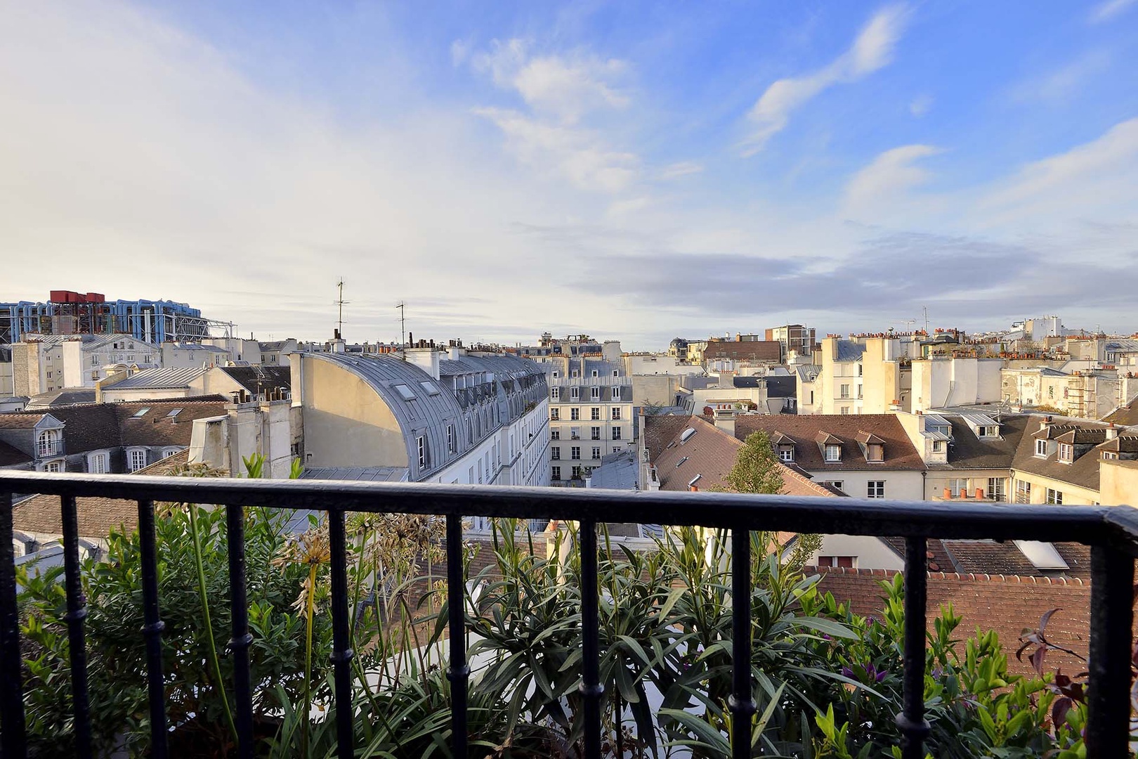 Enjoy panoramic Paris views from three step-out balconies.