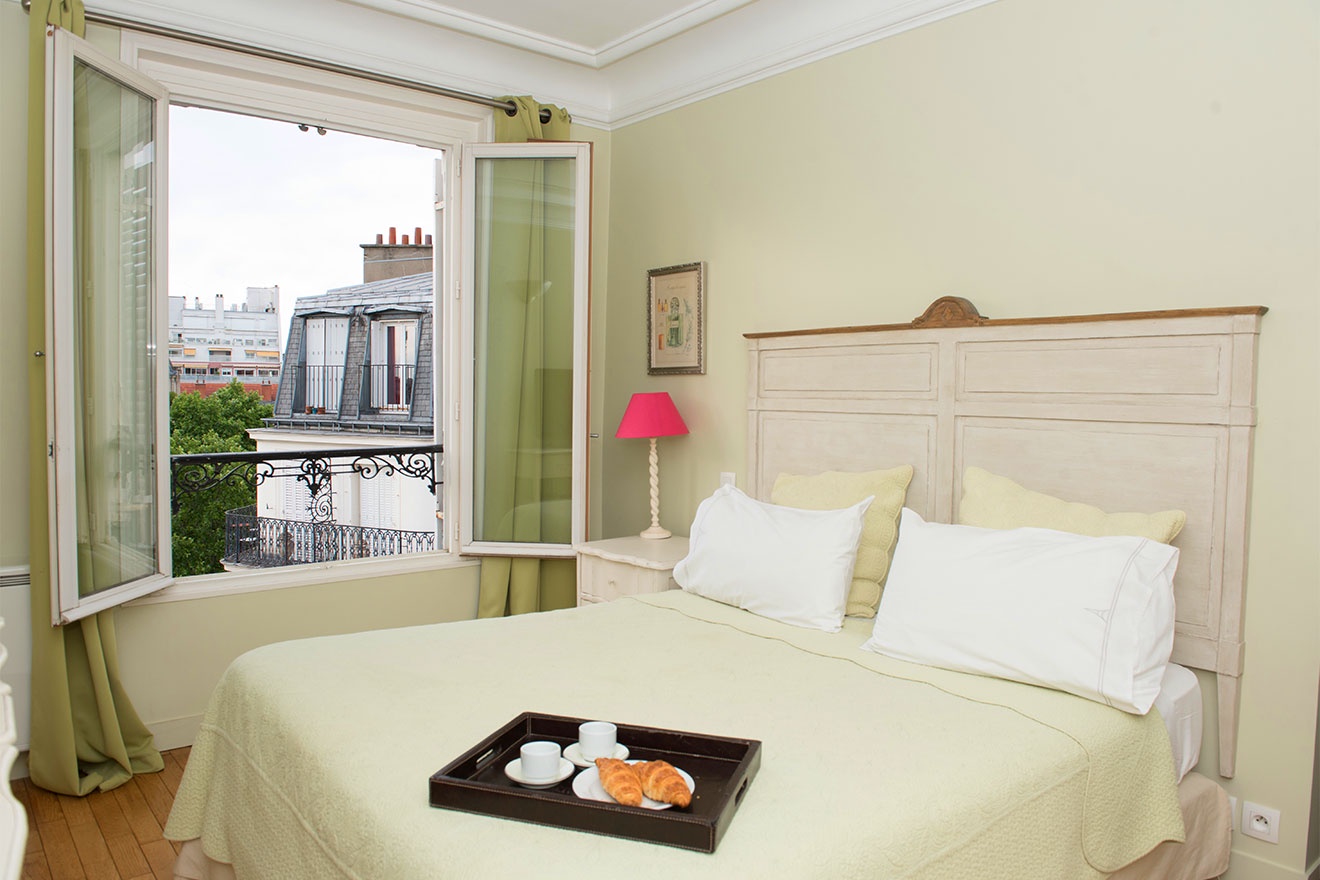 Enjoy French breakfast in bed in charming bedroom 1.