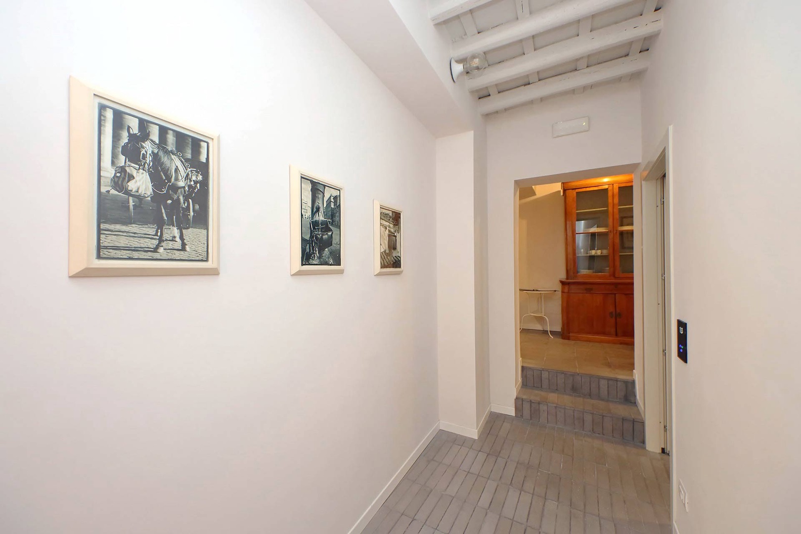 Hallway leading to bedrooms and bathrooms