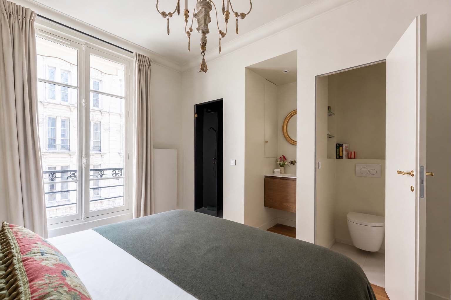 Bedroom 1 has a unique and creative en suite bathroom.
