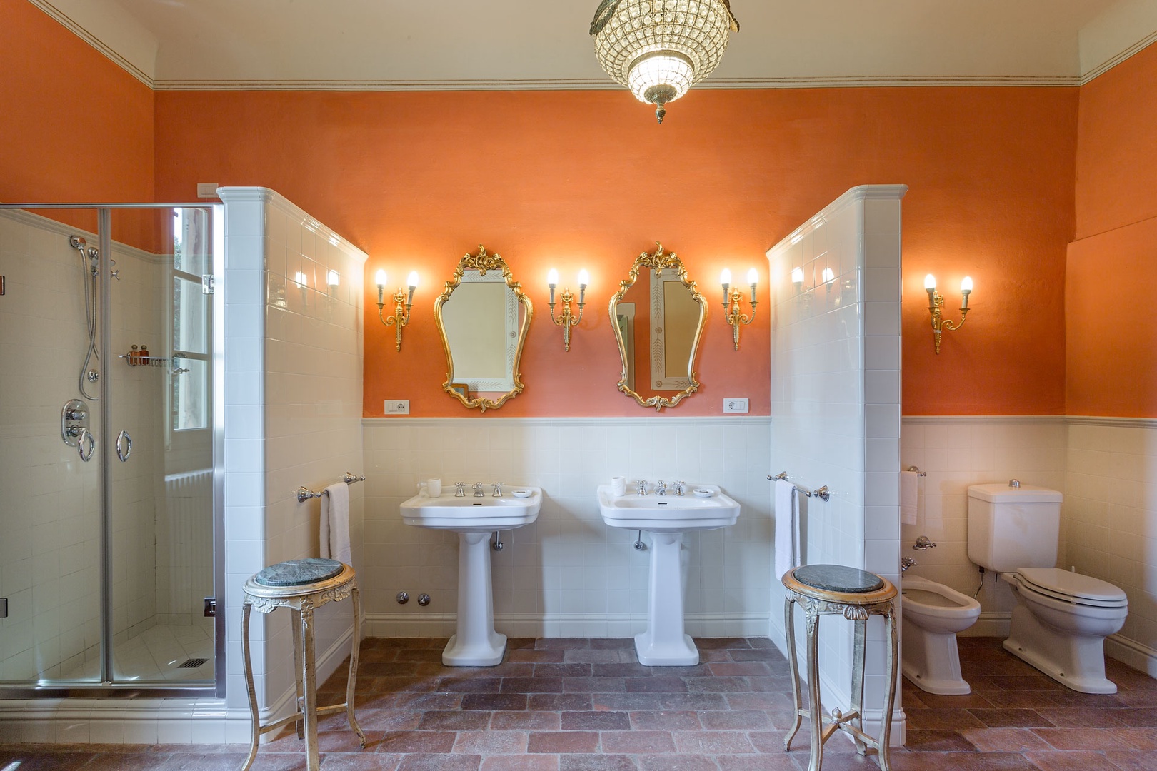 En suite bathroom with shower and bathtub