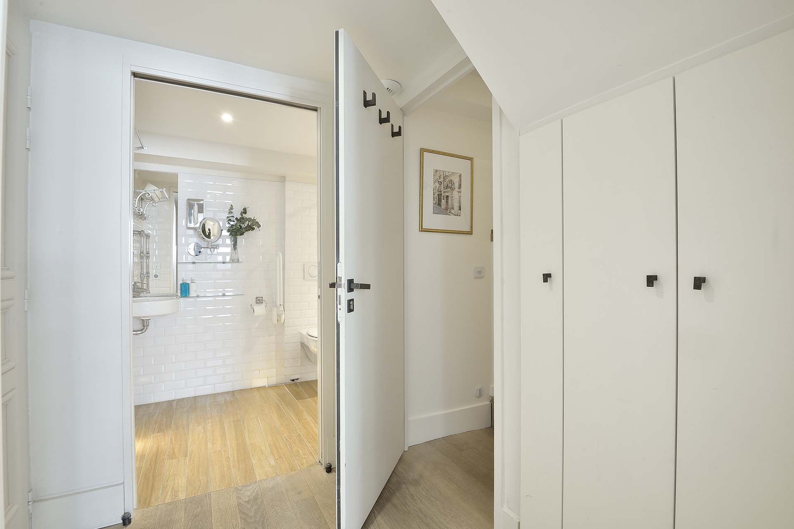 Bathroom 2 is equipped with an open shower.