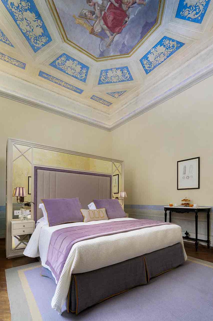 Beautiful frescoed ceiling in bedroom 1.