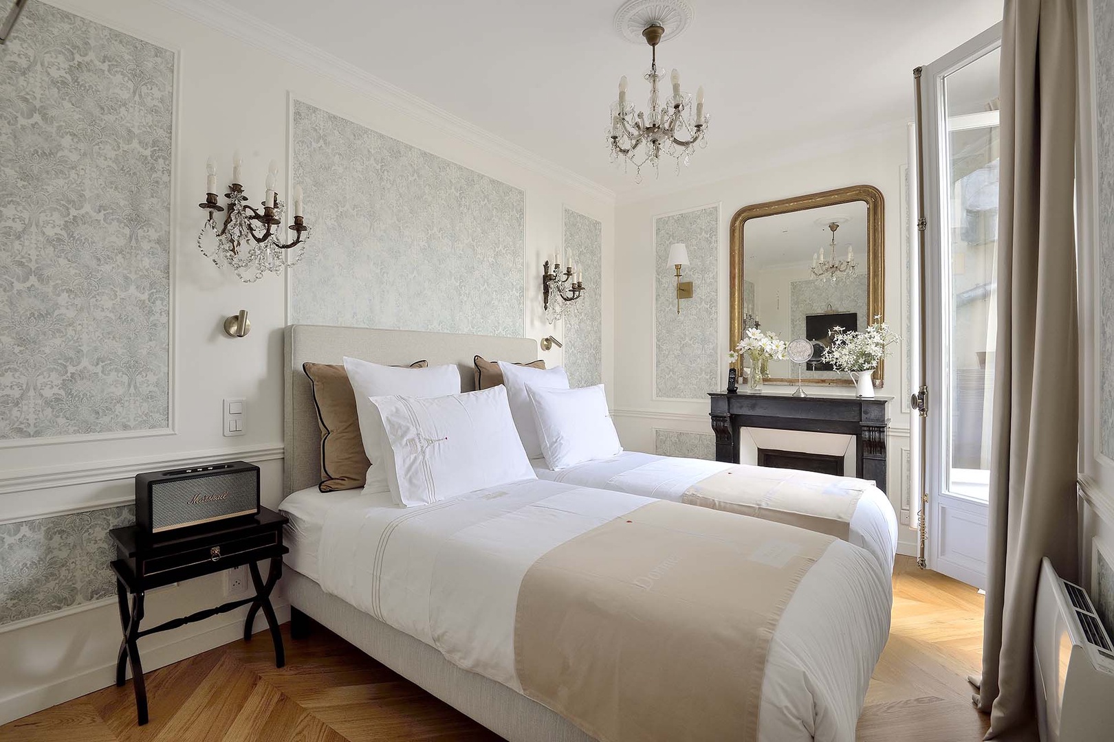 Bedroom 2 offers two beds or can be combined to form one bed.