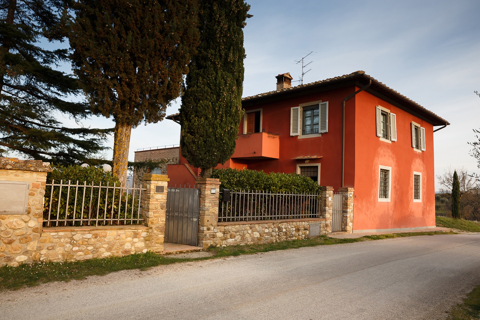 The aptly named Casa Rossa or "Red House" is a restored farmhouse painted in warm red tones.