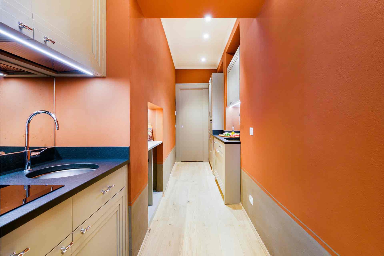 Step into the vibrant, fully-equipped kitchen.