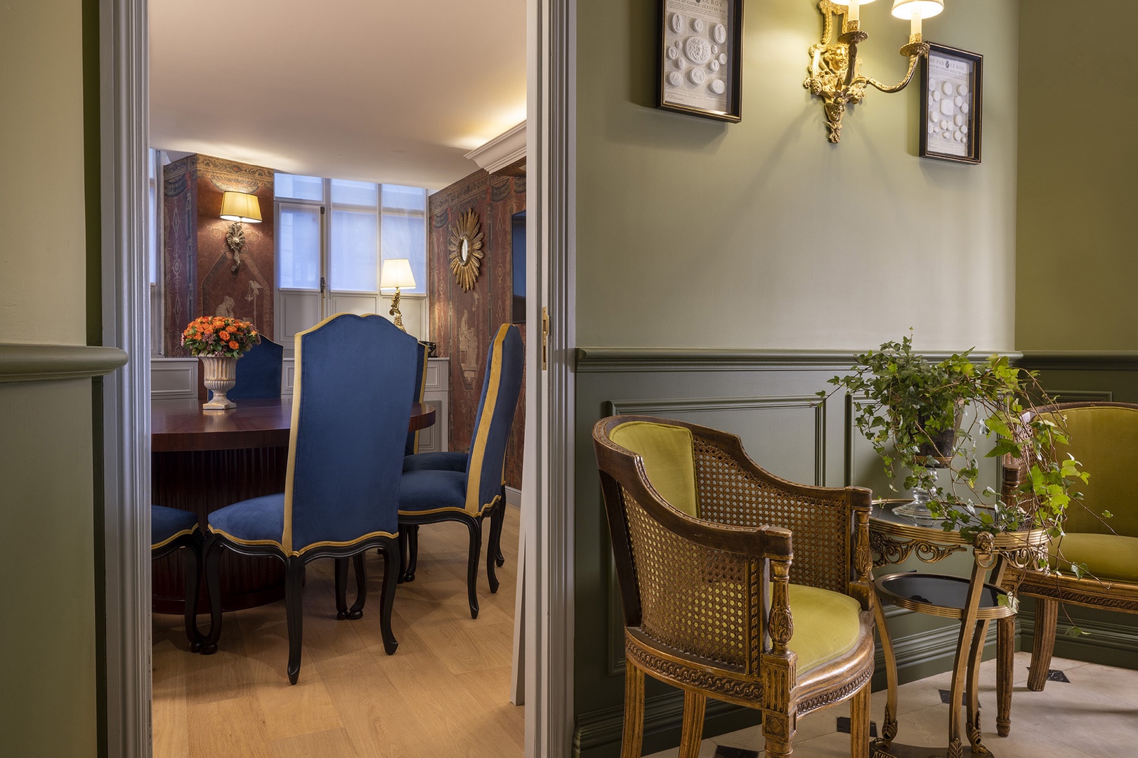 Dining room is located off of a small library.