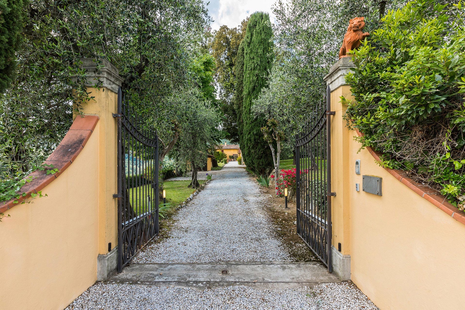 This private estate has a gate and is fenced.