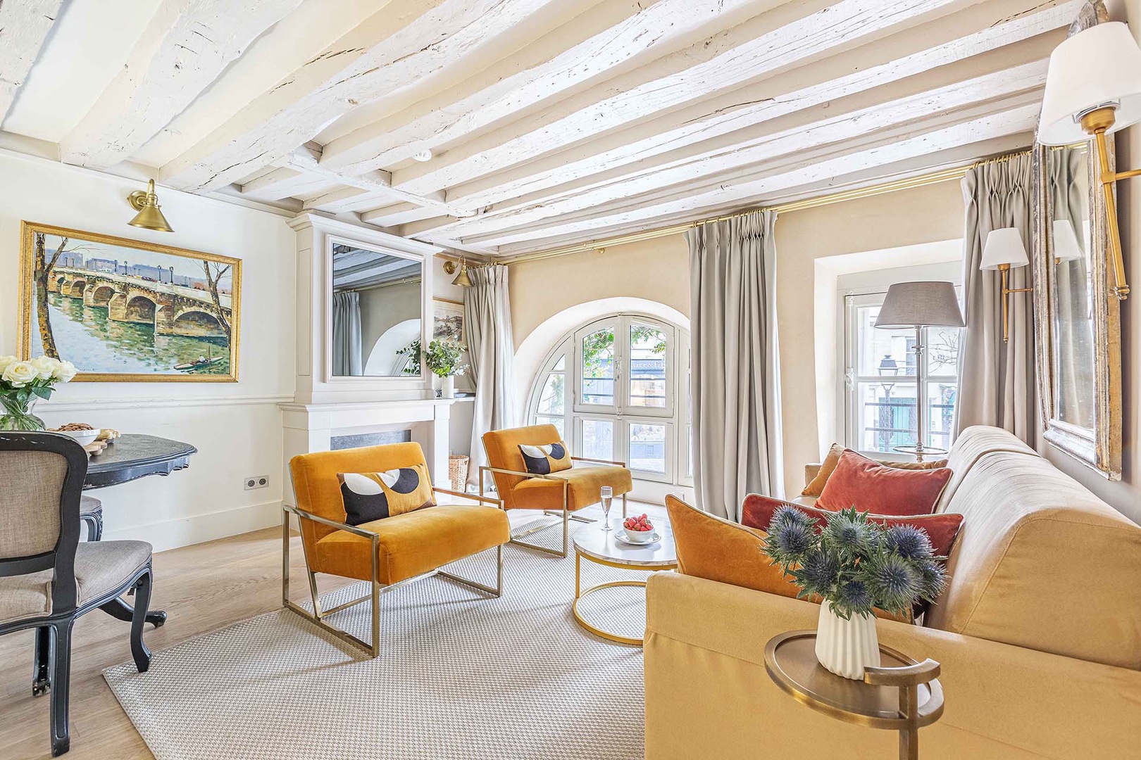 Make yourself at home at Anjou, a two-level apartment with historic charm!