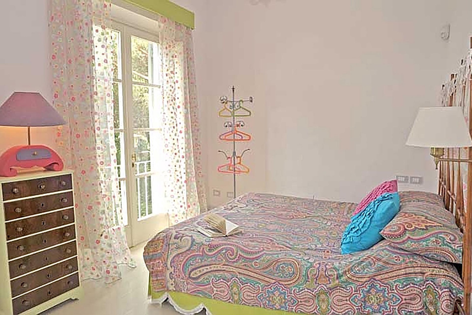 Bedroom 4 with balcony access.