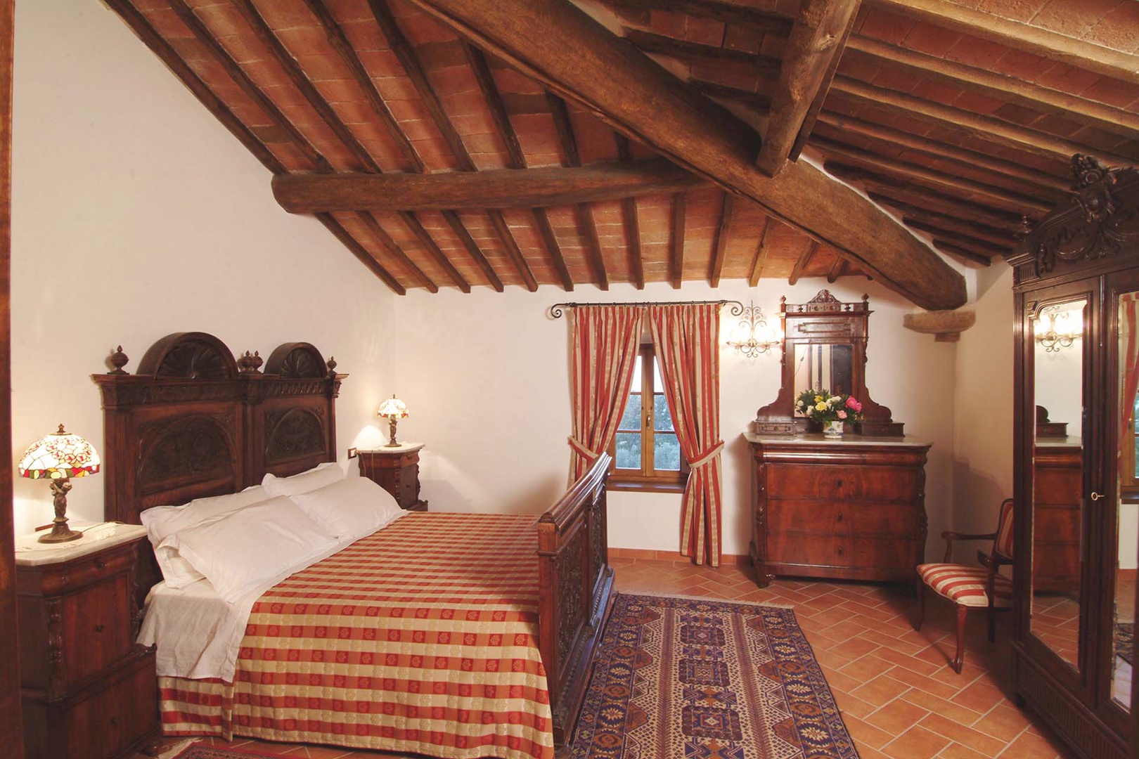 Wood beamed bedroom for two
