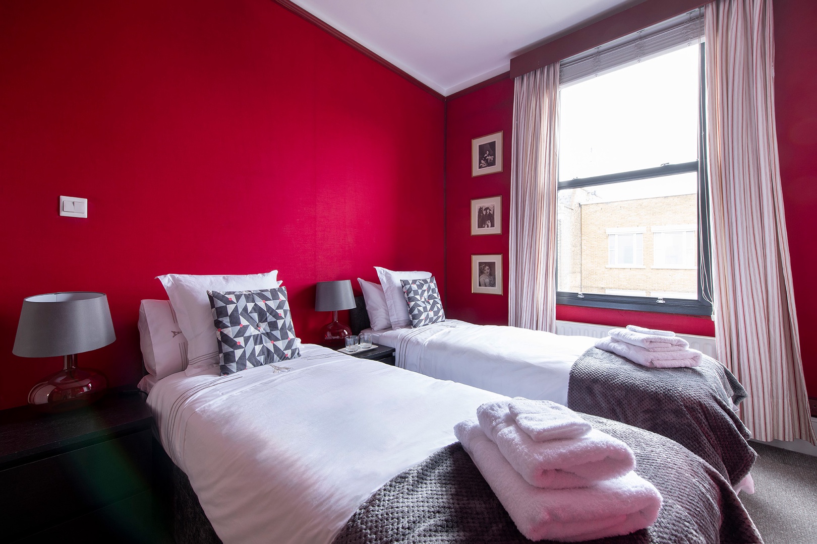 Bedroom 2 features two twin beds.