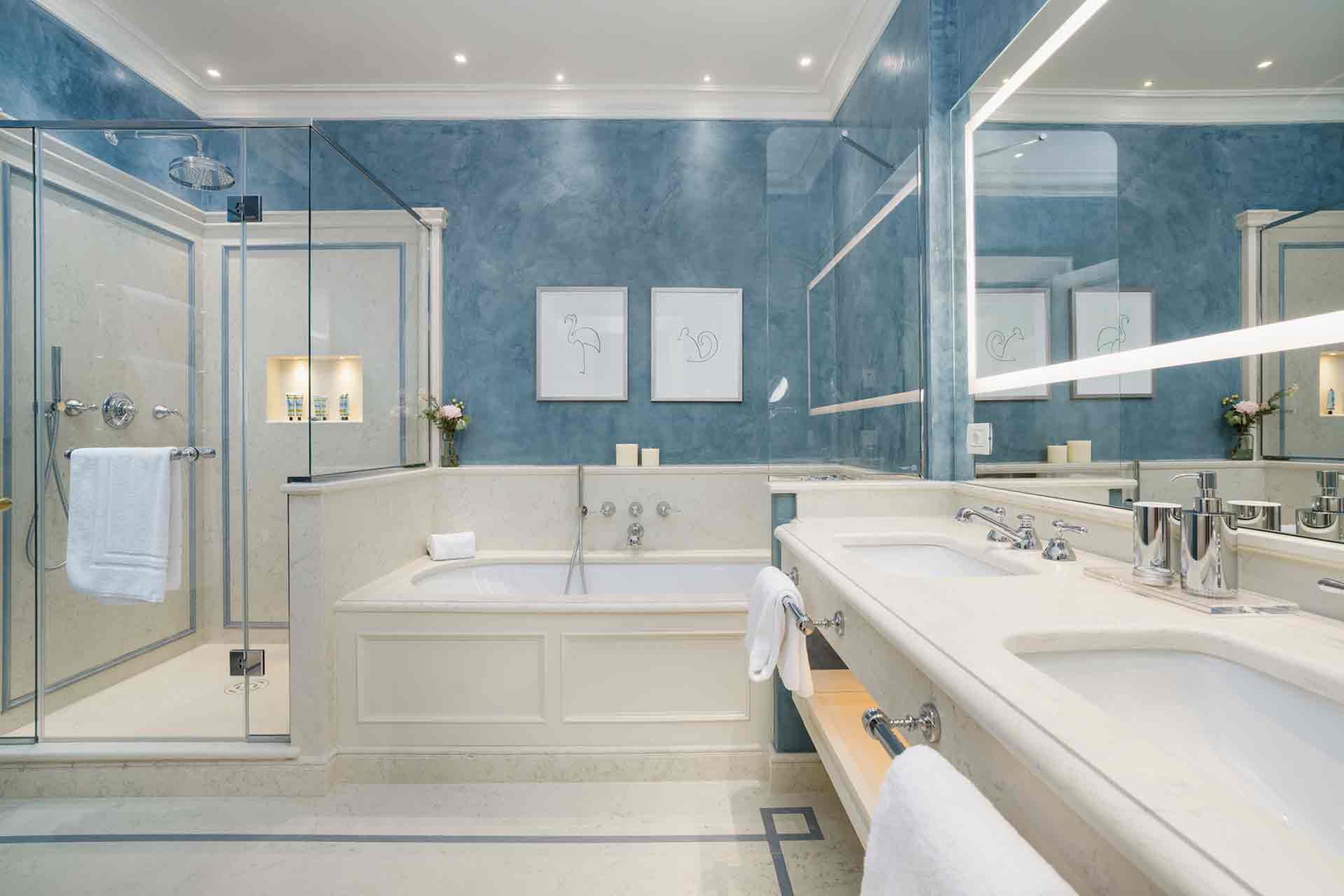 Soak your cares away in this elegant bathroom 2, with a deep soaking tub, and shower.