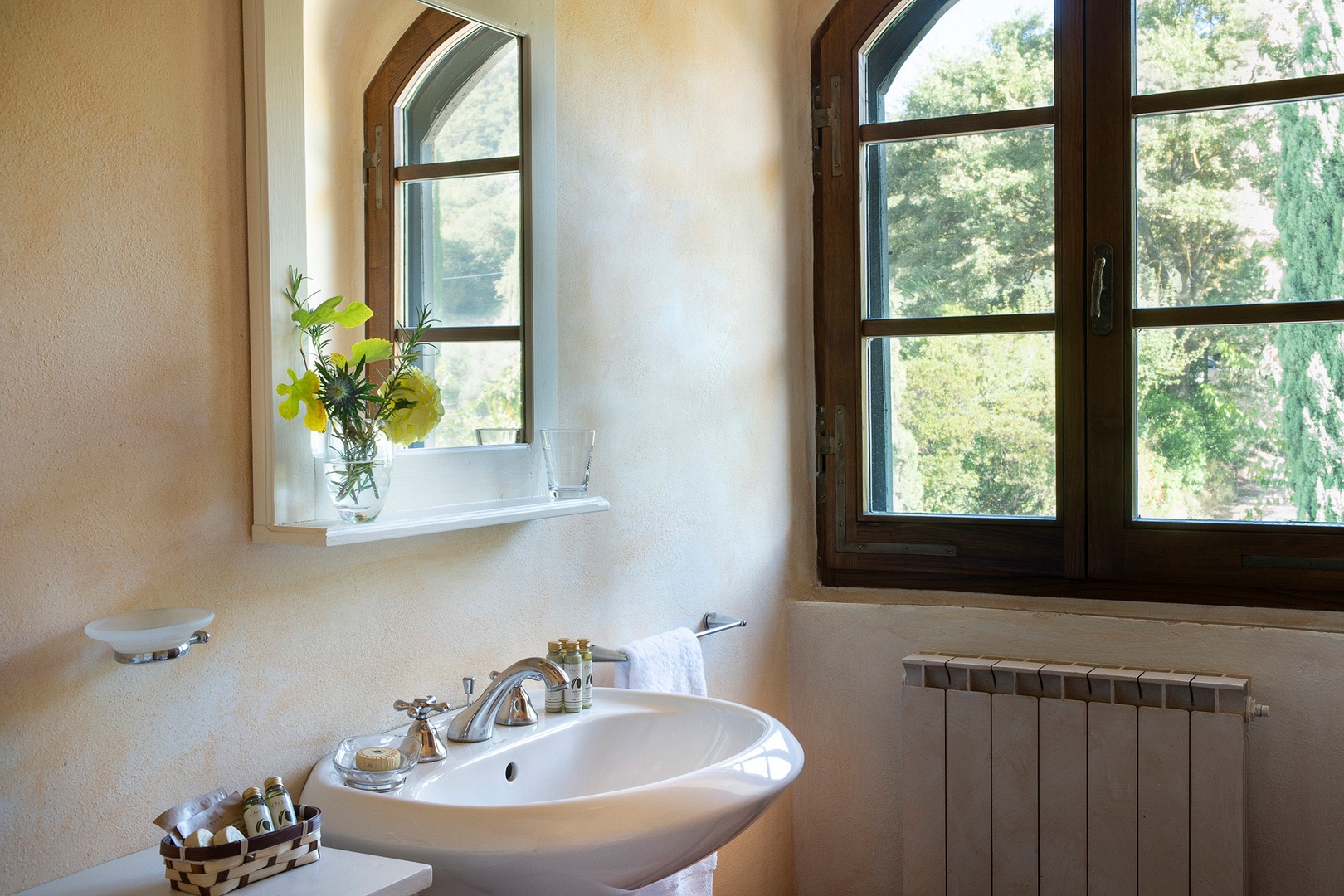 Bathroom is fitted with a shower, sink, toilet and bidet.