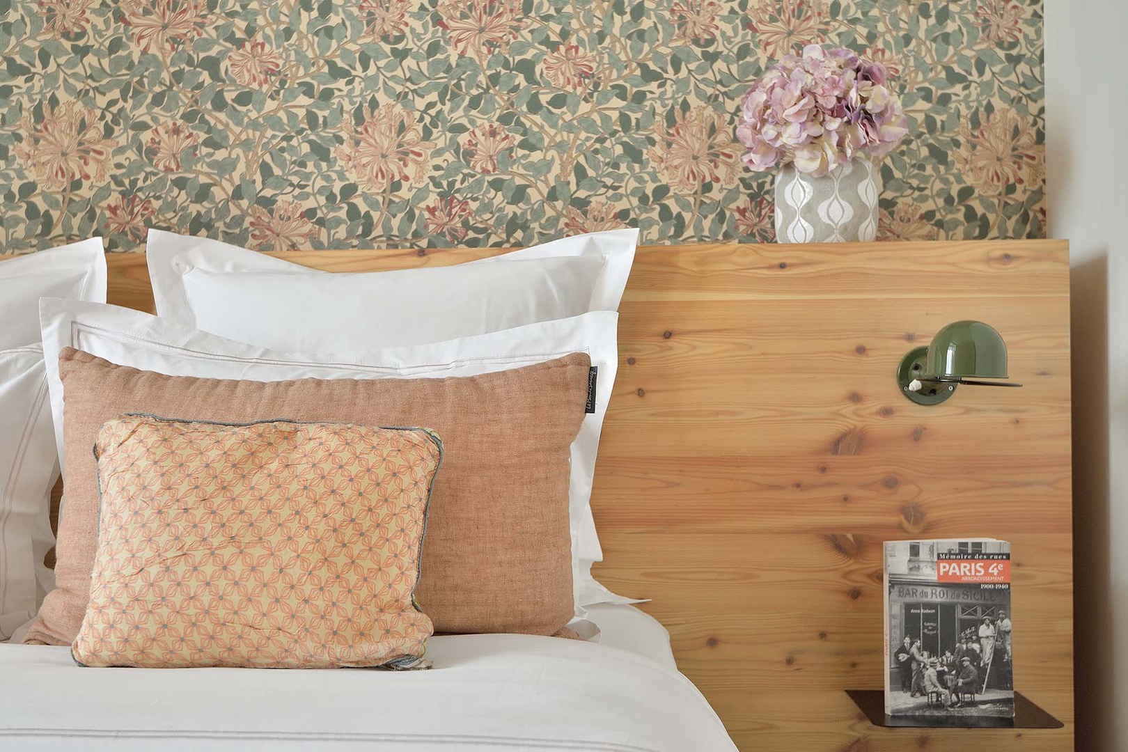 Peaceful colors and wood details in bedroom.