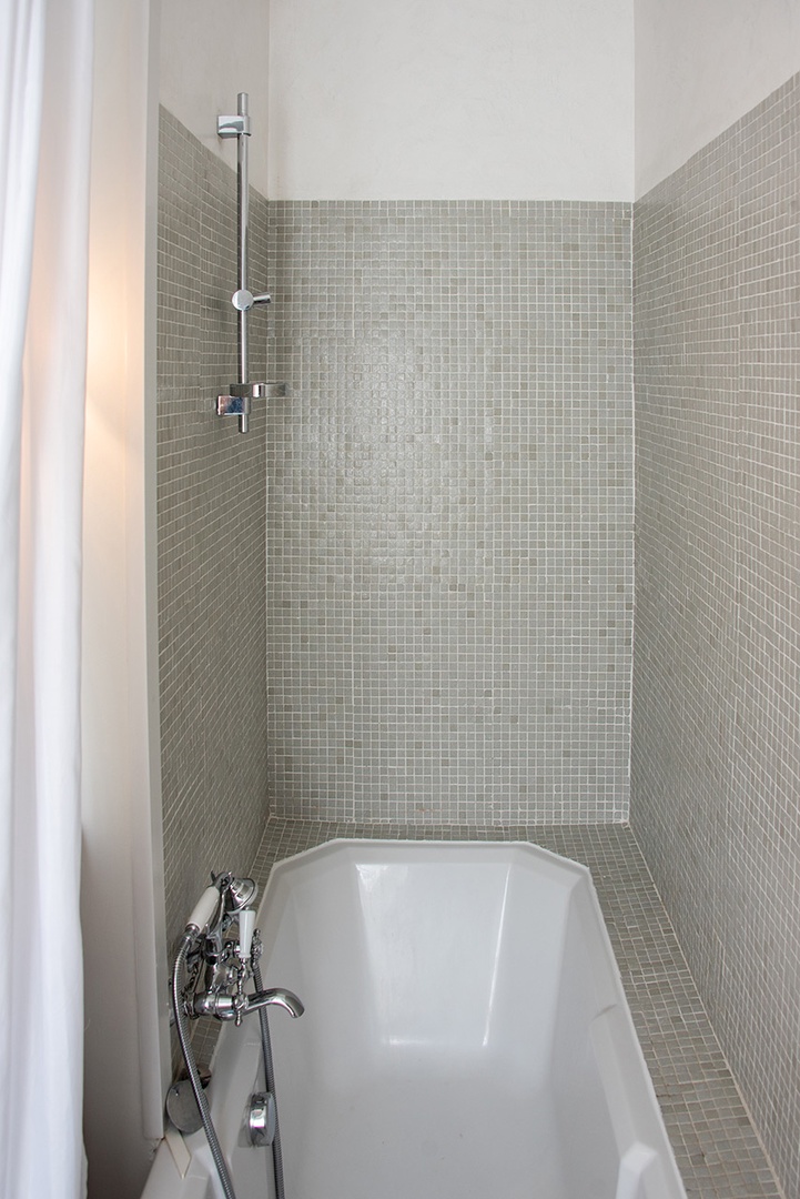 Bathroom 2 has a combination bathtub and shower.