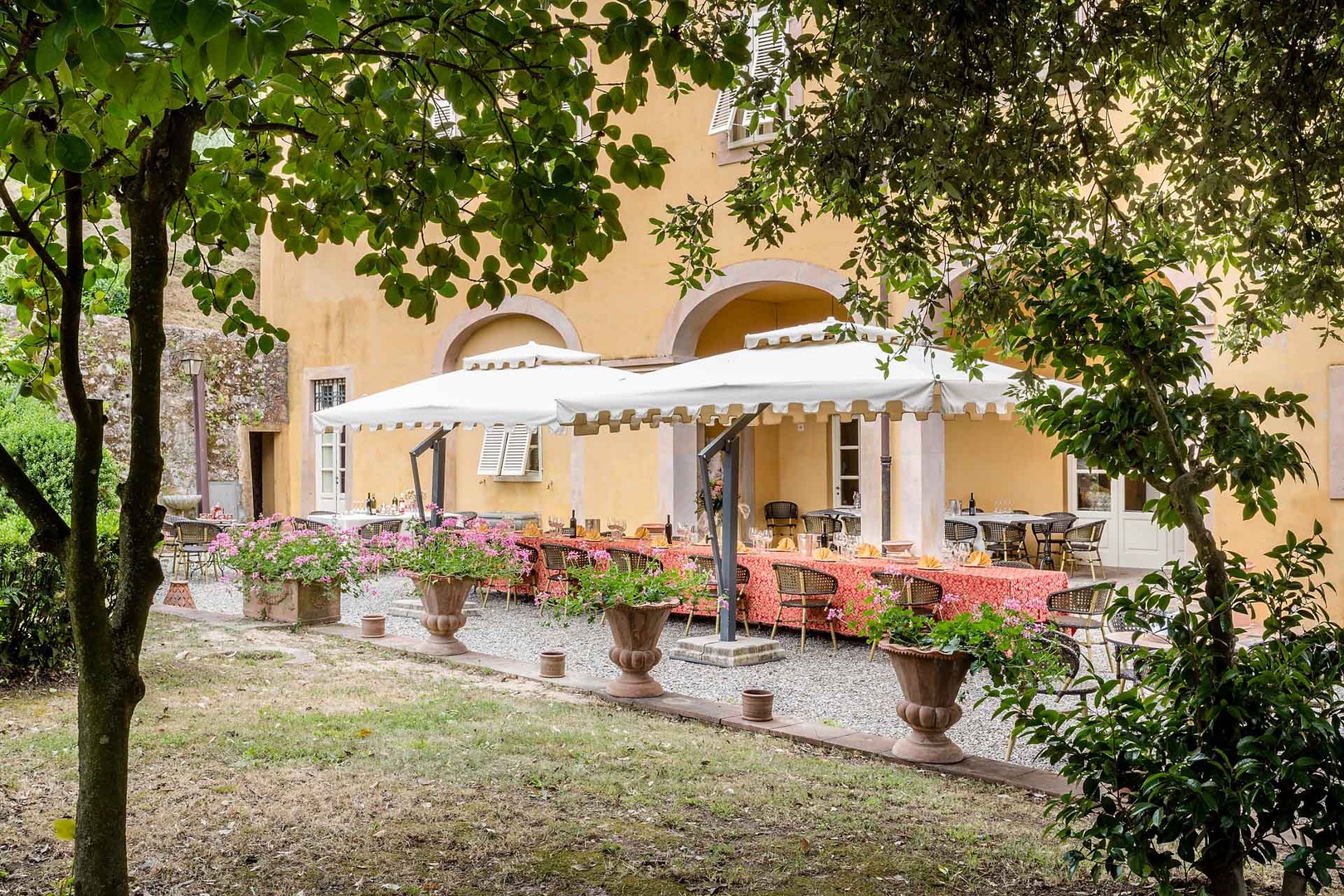 Large outdoor dining area with BBQ