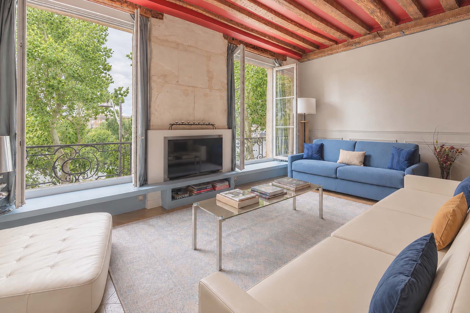 Chic décor blends seamlessly with historic architectural details.