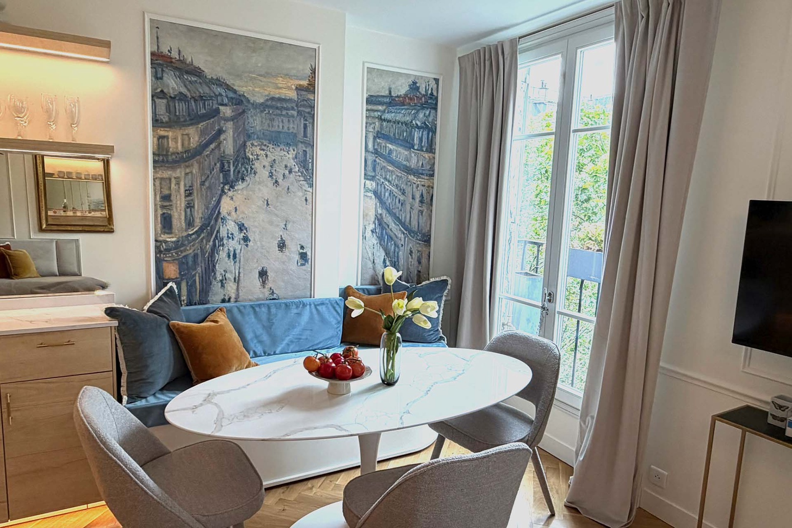 Iconic Haussmannian Paris street scene and matching cushions.